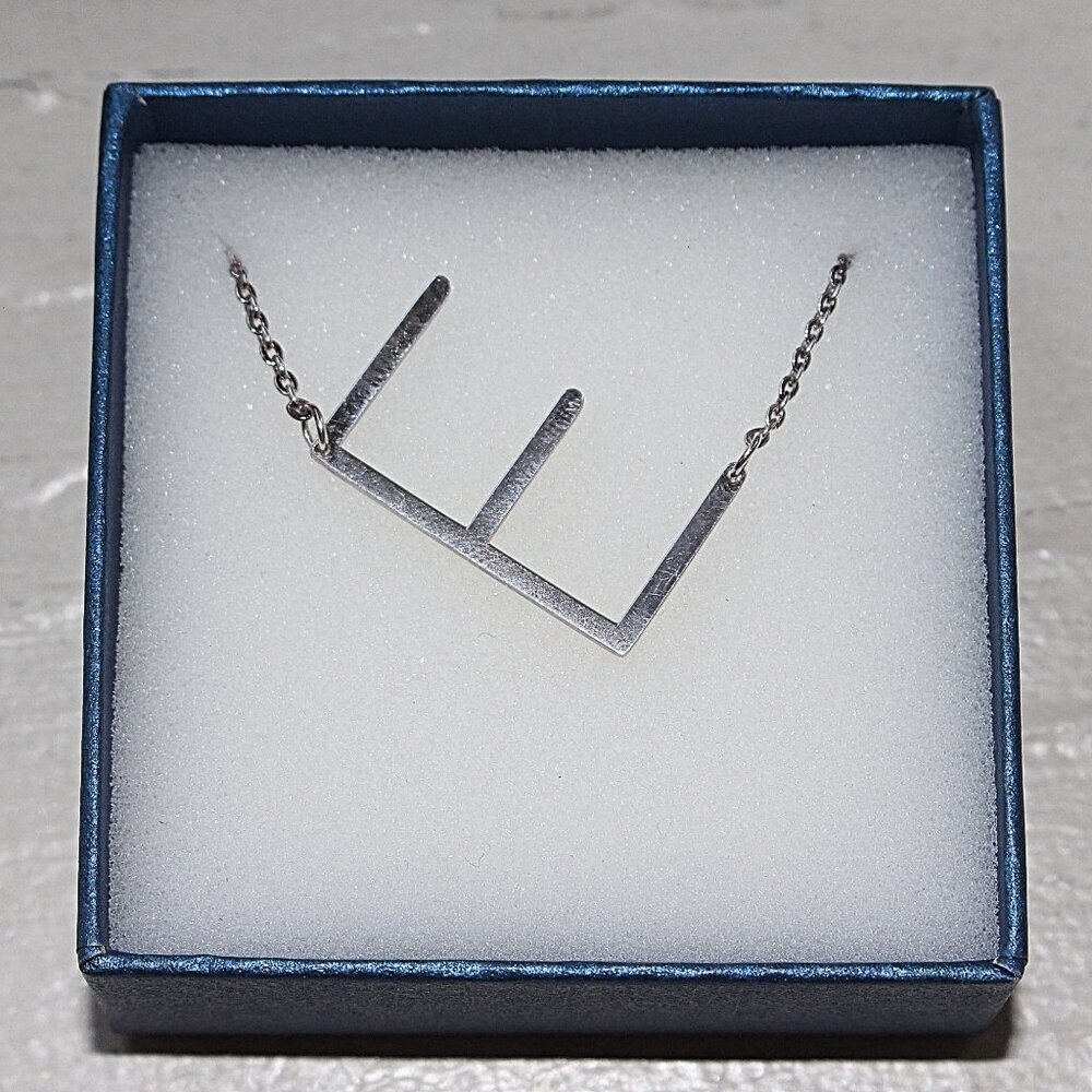 New in Box - Savvy Cie Jewels - Floating Initial "E" Necklace -Rhodium Stainless